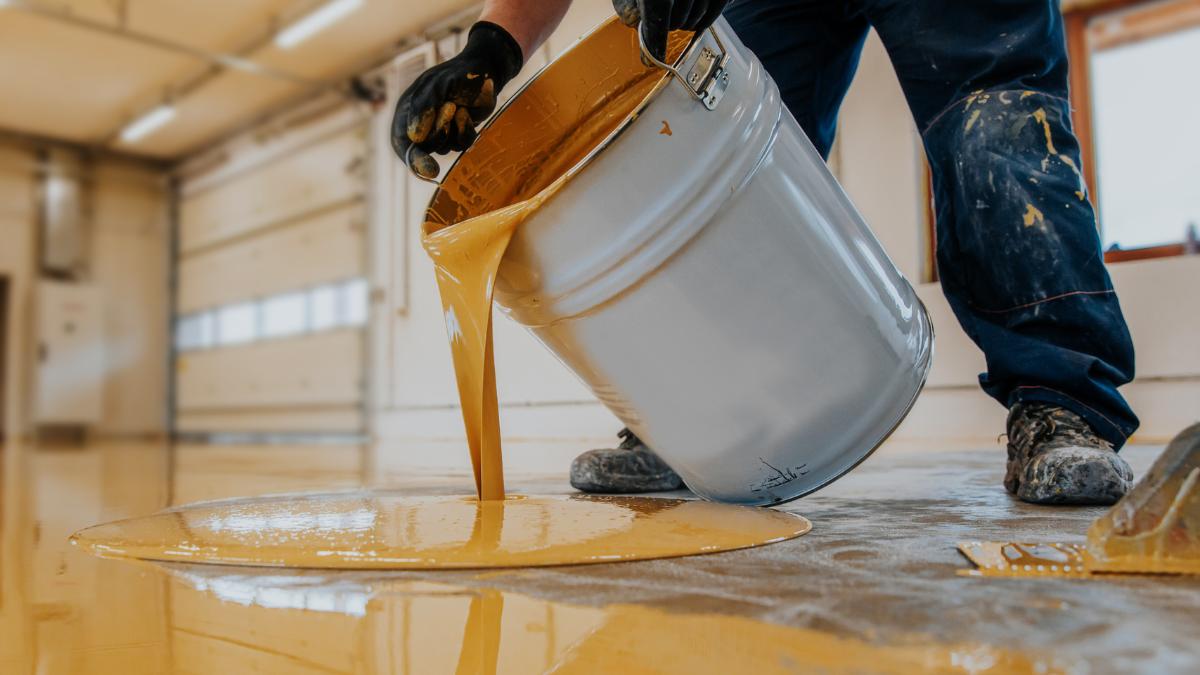 pouring paint in the floor